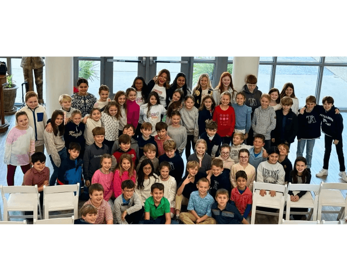 Students gathered after a Bama Against Bullying school visit
